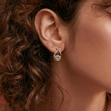 Ilka | Boucles d'oreilles avec pendentif en croix