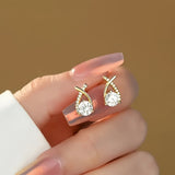 Ilka | Boucles d'oreilles avec pendentif en croix