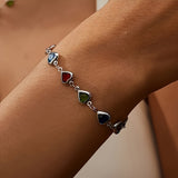 Merle | Bracelet avec pendentif en forme de cœur
