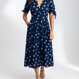 Clarisse™ — Robe midi à pois élégance naturelle