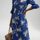 Lénora™ — Robe mi-longue florale liberté estivale