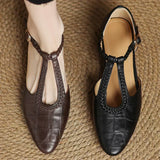 Greta – Chaussures classiques en cuir avec détail tressé