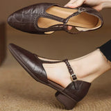 Greta – Chaussures classiques en cuir avec détail tressé