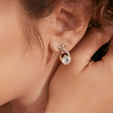 Ilka | Boucles d'oreilles avec pendentif en croix