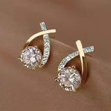 Ilka | Boucles d'oreilles avec pendentif en croix
