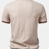 Polo homme texturé à col zippé contrasté