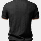 Polo homme texturé à col zippé contrasté